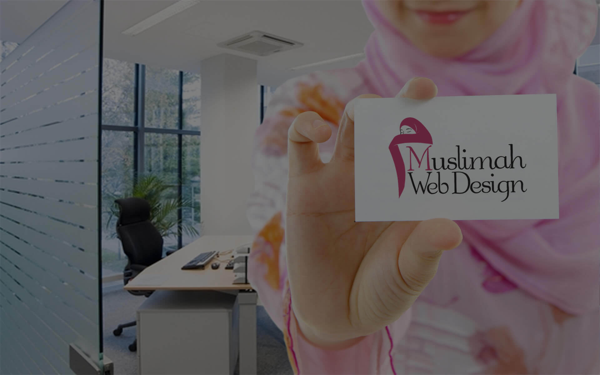 Muslimah Web Design business card, handed over for you to take